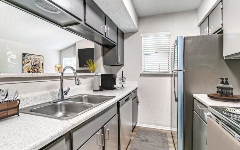 Beautiful kitchens with designer finishes a kitchen with stainless steel appliances