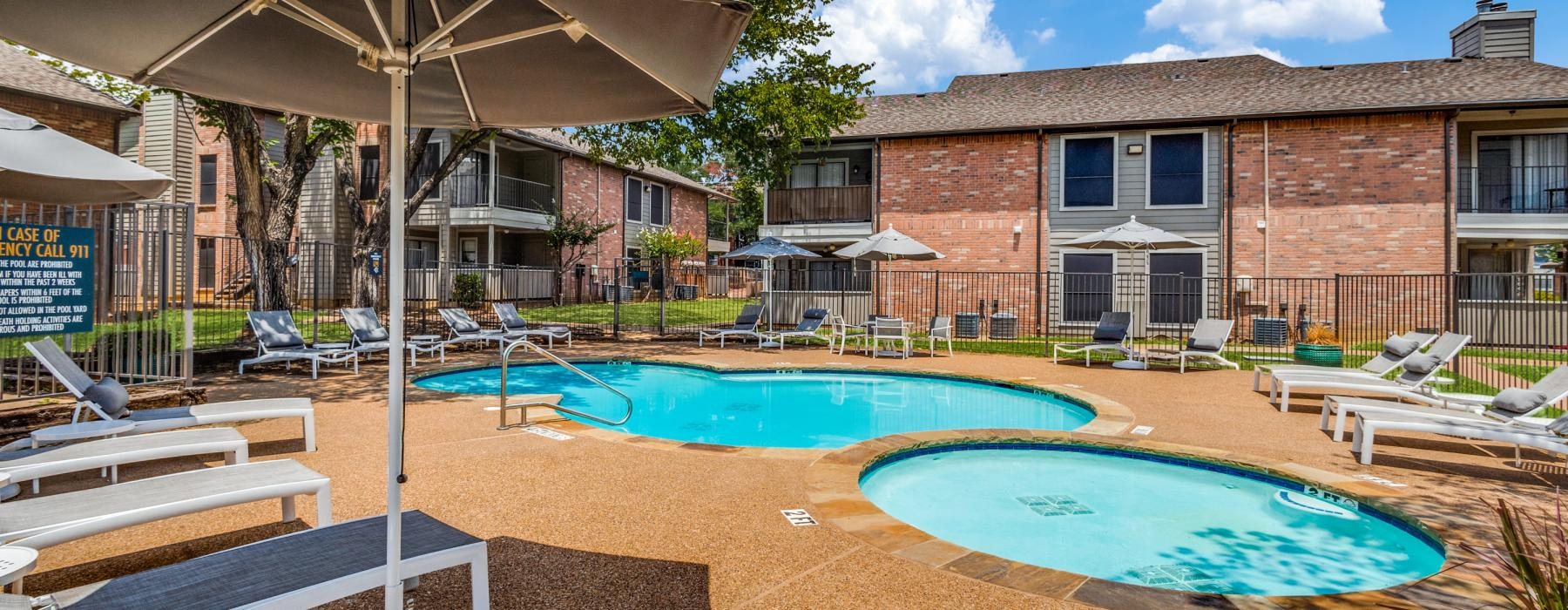 Resort-style swimming pool a swimming pool in a backyard